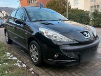 Gebraucht Peugeot 206+ 75 PS (55 kW) 2011 Schwarz Kleinwagen