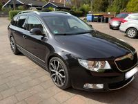 Używany Skoda Superb Elegance 170 KM (125 kW) 2011 Czarny Kombi