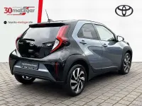 Gebraucht Toyota Aygo X Basis 72 PS (52 kW) 2025 1k3)/ black mica (209) (grau SUV