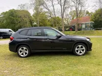 Second-hand BMW X1 143 CP (105 kW) 2014 Negru SUV
