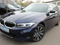 Gebraucht BMW 330 Sport Line 286 PS (210 kW) 2023 Tansanitblau ii metallic Kombi
