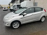 Używany Ford Fiesta Titanium 82 KM (60 kW) 2012 Srebrny Sedan/Limuzyna