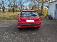 Gebraucht Peugeot 206+ 73 PS (53 kW) 2012 Rot Kleinwagen