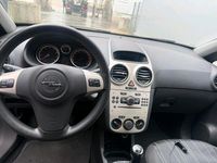 Second-hand Opel Corsa 60 CP (44 kW) 2006 Auriu Hatchback