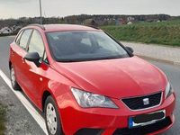 Używany Seat Ibiza 69 KM (50 kW) 2013 Czerwony Sedan/Limuzyna