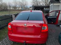 Second-hand Skoda Octavia 105 CP (77 kW) 2011 Roșu Berlinǎ