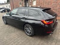 Gebraucht BMW 320e Shadowline 204 PS (150 kW) 2023 Schwarz Kombi