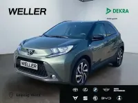 Gebraucht Toyota Aygo 72 PS (52 kW) 2023 Cardamon green / night sky black (gruen) Kleinwagen