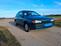 Gebraucht Mazda 323 73 PS (53 kW) 1993 Grün Kleinwagen