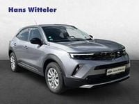 Gebraucht Opel Mokka-e Elegance 100 kW (136 PS) 2022 Kontrast grau/quarz silber SUV