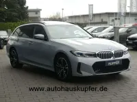 Gebraucht BMW 330e Performance 292 PS (214 kW) 2024 Brooklyngrau Kombi