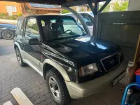 Gebraucht Suzuki Vitara 132 PS (97 kW) 1998 Schwarz Cabrio