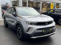 Gebraucht Opel Mokka-e Ultimate 100 kW (136 PS) 2023 Kontrast grau/quarz silber SUV