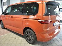 Second-hand VW Multivan 150 CP (110 kW) 2025 Portocaliu Monovolum