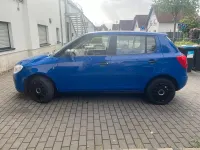 Używany Skoda Fabia 69 KM (50 kW) 2009 Niebieski Sedan/Limuzyna