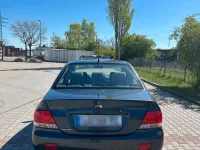 Second-hand Mitsubishi Lancer 98 CP (72 kW) 2004 Gri Berlinǎ