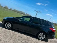 Gebraucht Ford Focus 125 PS (91 kW) 2011 Schwarz Kombi