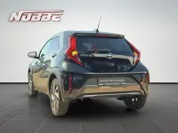 Gebraucht Toyota Aygo X X-plore 72 PS (52 kW) 2023 Cardamom green metallic/dach m SUV