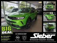 Gebraucht Opel Mokka Elegance 131 PS (96 kW) 2024 Lackierung matcha green/typ au SUV
