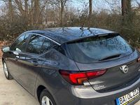 Używany Opel Astra Edition 125 KM (91 kW) 2016 Brązowy Sedan/Limuzyna