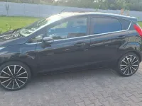 Gebraucht Ford Fiesta Individual 125 PS (91 kW) 2014 Schwarz Kleinwagen