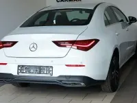 Gebraucht Mercedes CLA200 150 PS (110 kW) 2023 Digitalweiss  metalliclack (metallic) Coupé