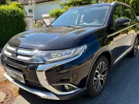 Używany Mitsubishi Outlander Top 150 KM (110 kW) 2016 Czarny SUV