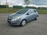 Usado Opel Corsa Catch Me 80 HP (58 kW) 2007 Cinzento Citadino