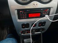 Używany Dacia Sandero 75 KM (55 kW) 2012 Czerwony Hatchback