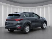 Gebraucht Kia Sportage 136 PS (100 kW) 2021 H8g) pentametal met. (grau SUV