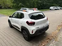Gebraucht Dacia Spring Essentiel 33 kW (45 PS) 2023 Polarweiss (metallic) Kleinwagen
