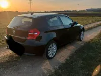 Gebraucht BMW 116 122 PS (89 kW) 2009 Schwarz Kleinwagen