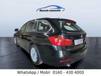 Second-hand BMW 318 Comfort Edition 143 CP (105 kW) 2013 Negru Break