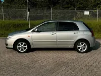 Używany Toyota Corolla 110 KM (80 kW) 2005 Srebrny Hatchback