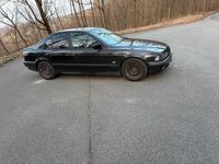 Używany BMW 523 170 KM (125 kW) 1999 Czarny Sedan/Limuzyna