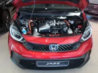 Gebraucht Honda Jazz Advance 122 PS (89 kW) 2024 Premium crystal red metallic (metallic) Kleinwagen
