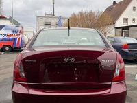Gebraucht Hyundai Accent 75 PS (55 kW) 2009 Rot Limousine