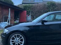 Gebraucht BMW 116 122 PS (89 kW) 2010 Schwarz Kleinwagen