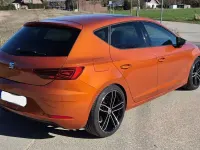 Używany Seat Leon 110 KM (80 kW) 2018 Pomarańczowy Sedan/Limuzyna