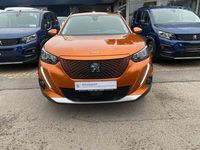 Gebraucht Peugeot e-2008 Allure 100 kW (136 PS) 2021 Fusion orange met. SUV