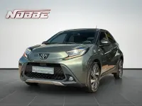 Gebraucht Toyota Aygo X X-plore 72 PS (52 kW) 2023 Cardamom green metallic/dach m SUV