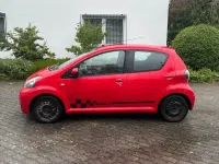 Second-hand Toyota Aygo 68 CP (50 kW) 2009 Roșu Hatchback
