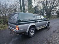 Gebraucht Mitsubishi L200 132 PS (97 kW) 2001 Grün Abholung