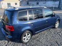 Second-hand VW Touran 140 CP (102 kW) 2013 Albastru Monovolum