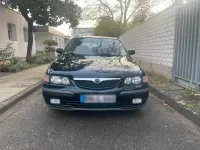 Second-hand Mazda 626 90 CP (66 kW) 1999 Verde Berlinǎ