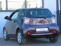 Używany Toyota iQ 68 KM (50 kW) 2009 Purpurowy Hatchback