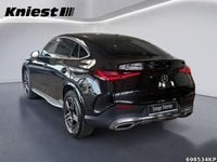 Gebraucht Mercedes GLC300e AMG 313 PS (230 kW) 2025 Metalliclack obsidianschwarz Coupé
