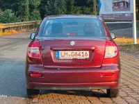 Gebraucht Suzuki SX4 107 PS (78 kW) 2010 Rot Limousine