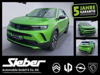Gebraucht Opel Mokka-e Elegance 100 kW (136 PS) 2023 Matcha grün SUV