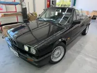 Second-hand BMW 320 150 CP (110 kW) 1992 Negru Cabrio